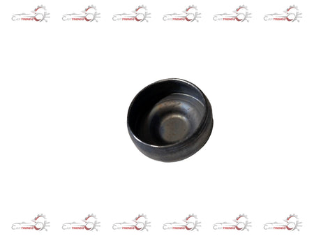 Ford engine plug, part #1225841, shown in a close-up image, designed for Ford engine maintenance and repairs