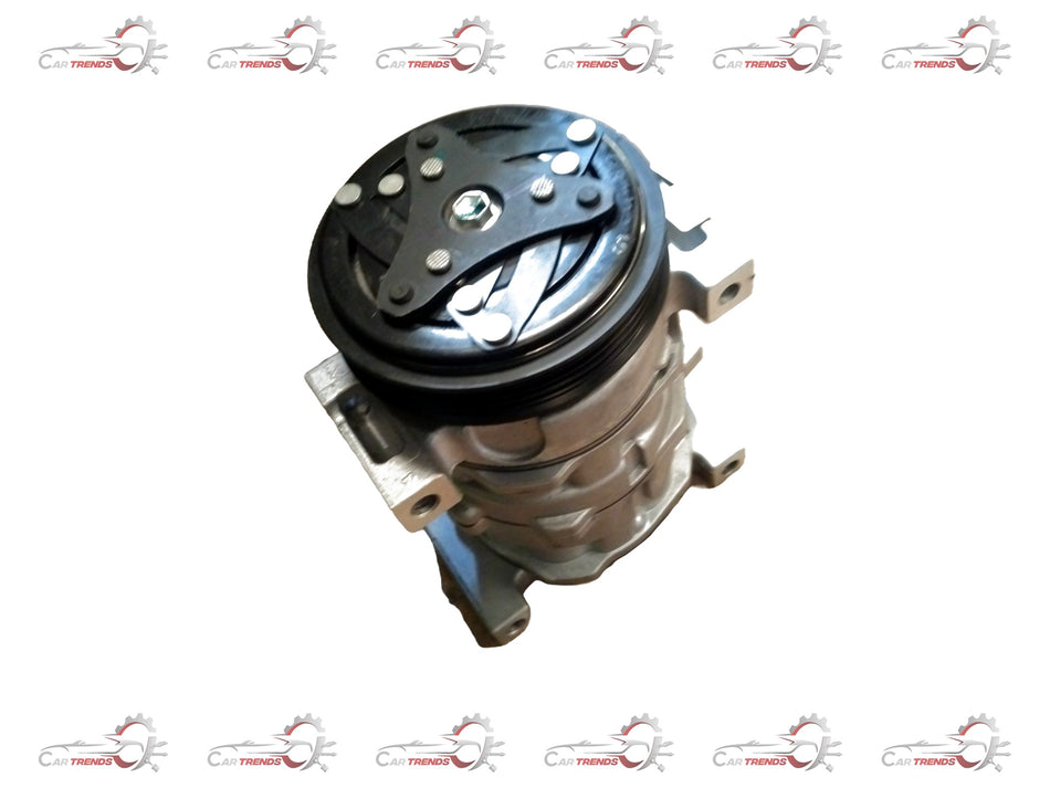 CarTrends air conditioner compressor 138cc for Mahindra Scorpio, showing the compact, metallic compressor unit with mounting points.