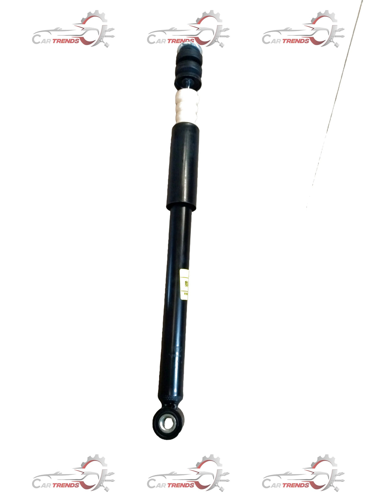 Maruti Suzuki Ertiga shock absorber rear view, showing the black metal component with mounting points and hydraulic parts.
