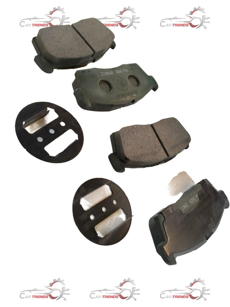 Front brake pad for Maruti Suzuki Alto K10, showing the black friction material and metal backing plate.