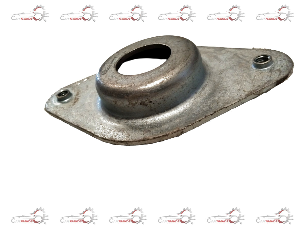 Nissan front suspension strut, compatible with Renault vehicles, showing a close-up of the suspension component.