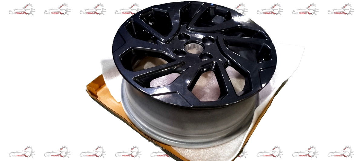 Maruti Suzuki alloy wheel for Fronx vehicle, featuring a stylish multi-spoke design in a close-up view.
