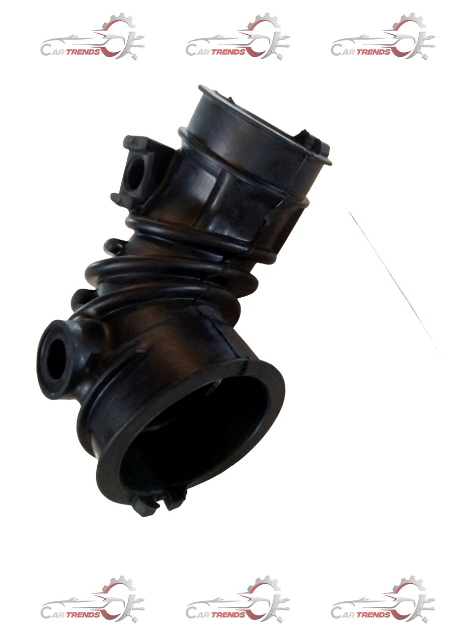 Maruti Suzuki air cleaner hose for Baleno and Breeza models, showing a flexible black rubber hose with connectors.