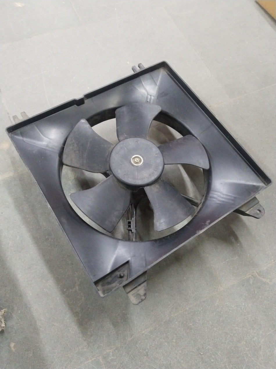 Chevrolet Optra fan main from General Motors showing the metal fan blade and motor assembly in a close-up image.