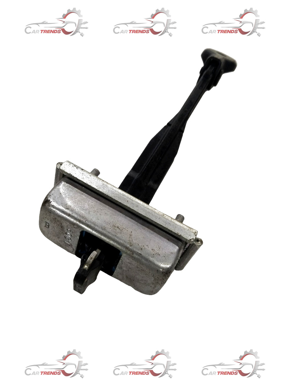 CarTrends Chevrolet Cruze rear door checker, close-up of the door hinge and latch mechanism.
