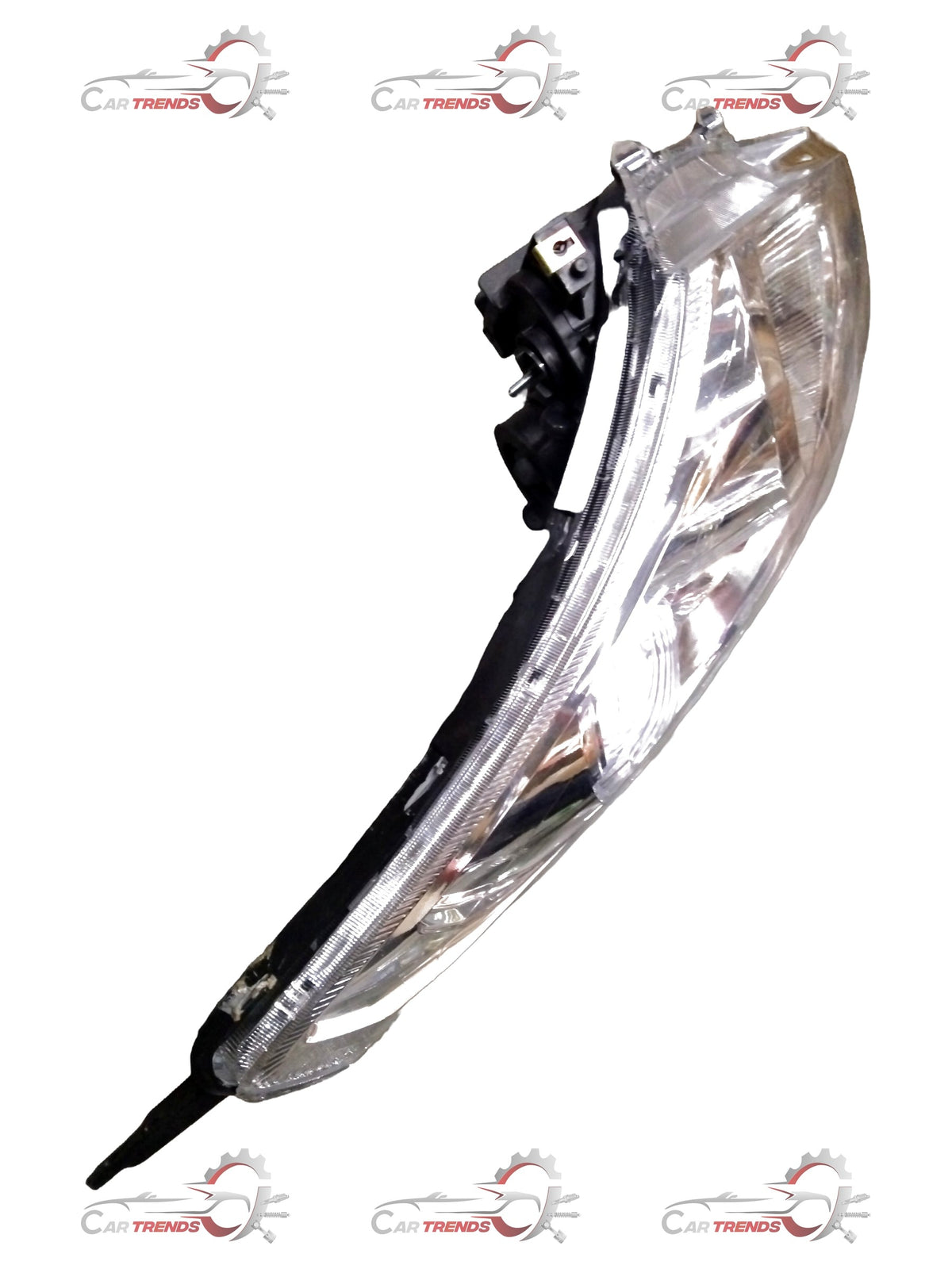 CarTrends Swift 2nd Gen left headlamp assembly showing the clear lens and housing for vehicle lighting.