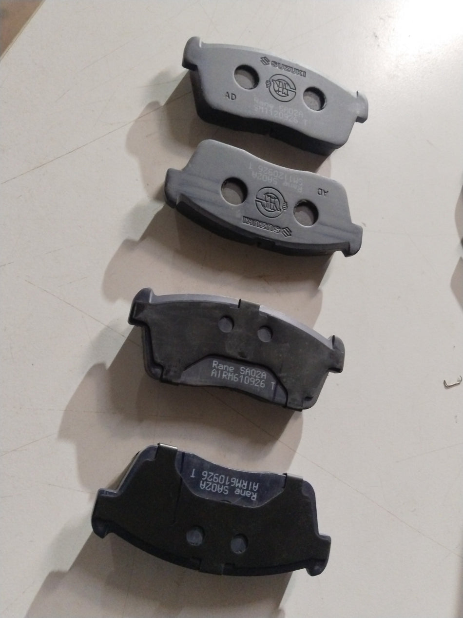 Front brake pad for Maruti Suzuki Eeco and Versa, all variants, showing the new brake pad with metal backing and friction surface.