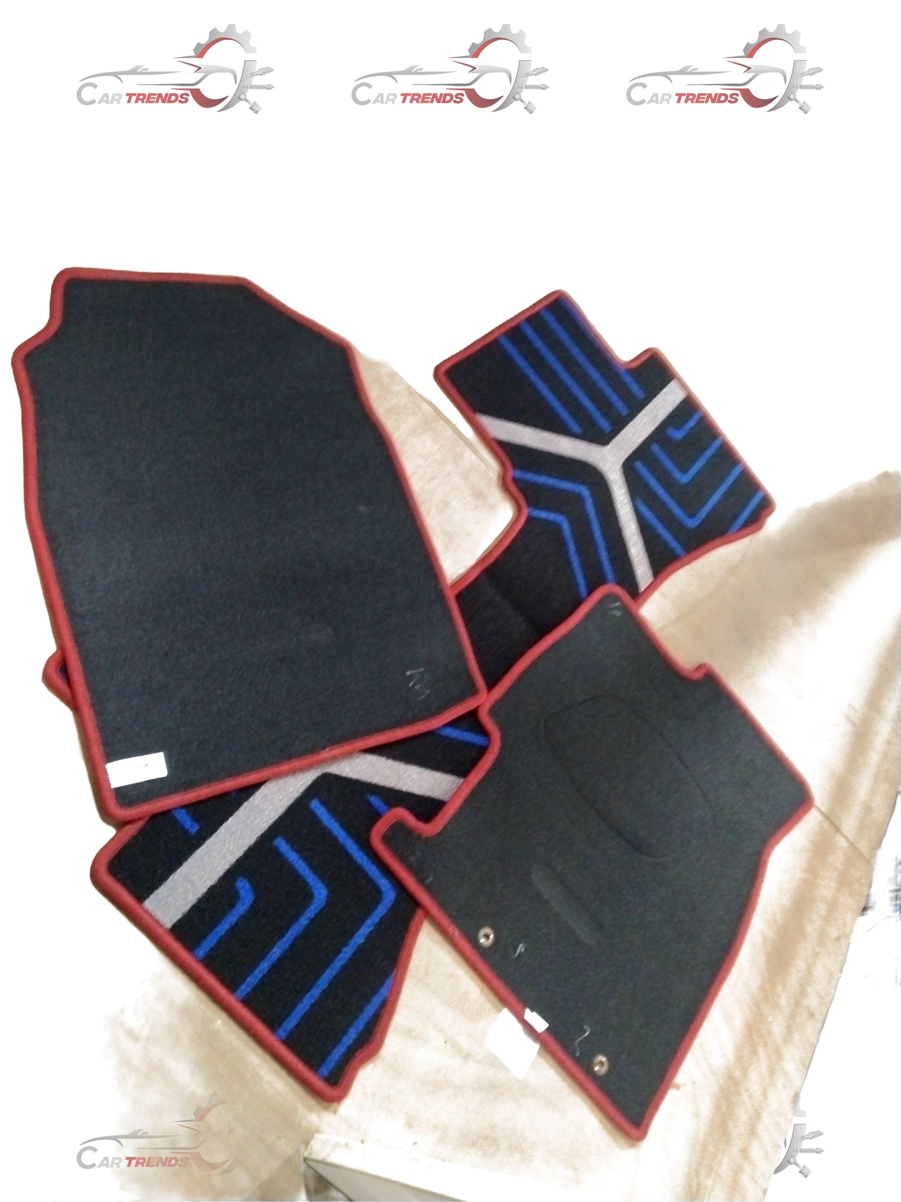 Red Honda floor mat with City, Amaze, Elevate, and WR-V branding, showing textured rubber surface and custom fit design.