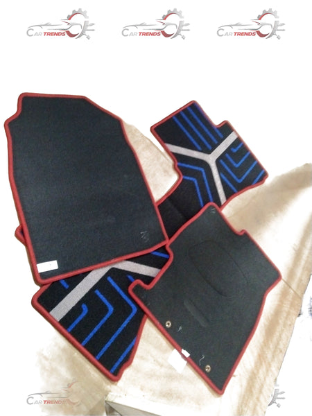 Red Honda floor mat with City, Amaze, Elevate, and WR-V branding, showing textured rubber surface and custom fit design.