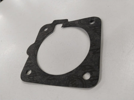 Fuel injector gasket for Chevrolet Corsa, showing a close-up of the gasket body used in fuel meter assemblies by General Motors.