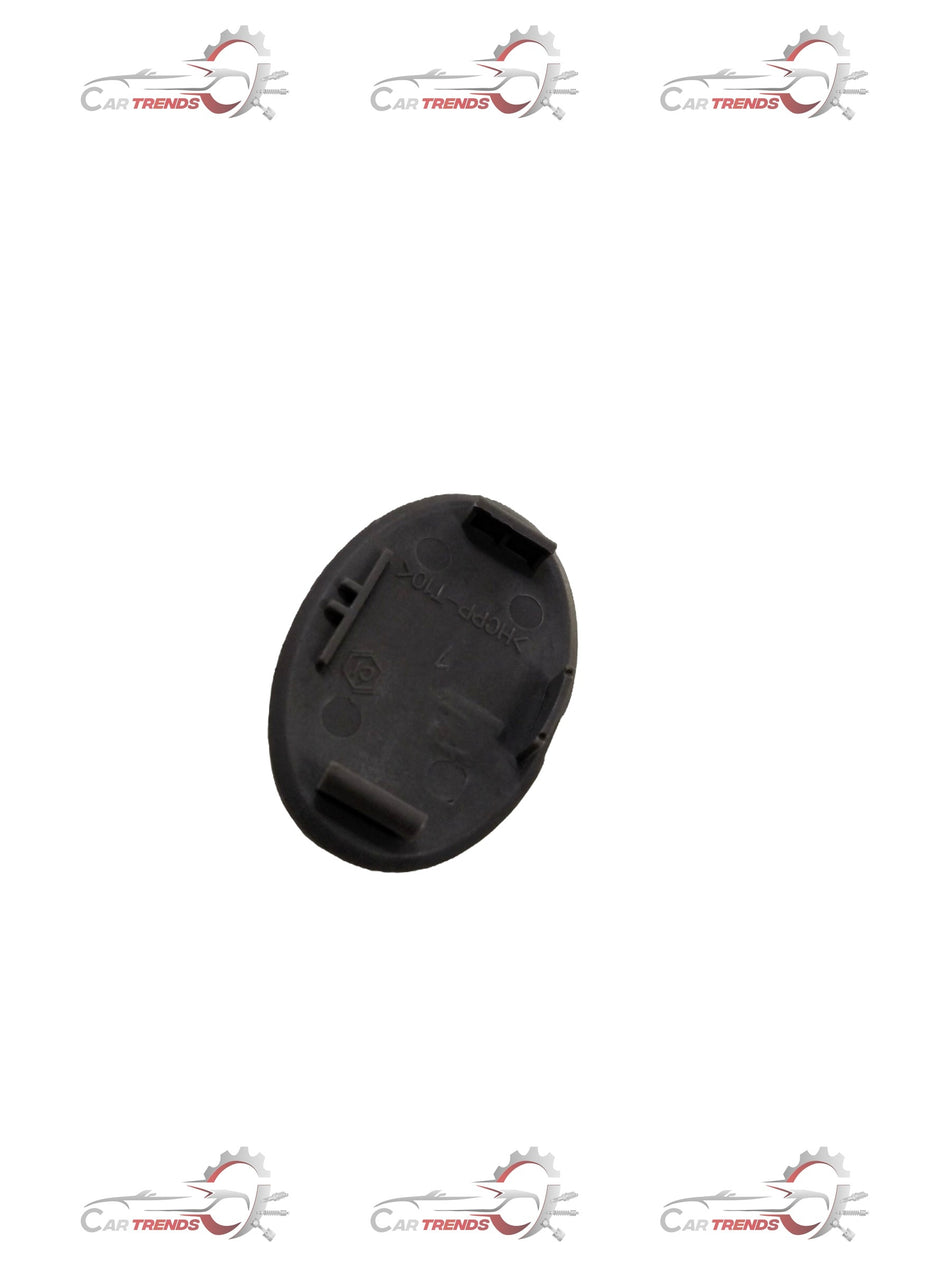 Chevrolet Aveo plug console from General Motors, showing the black plastic component with connector ports.