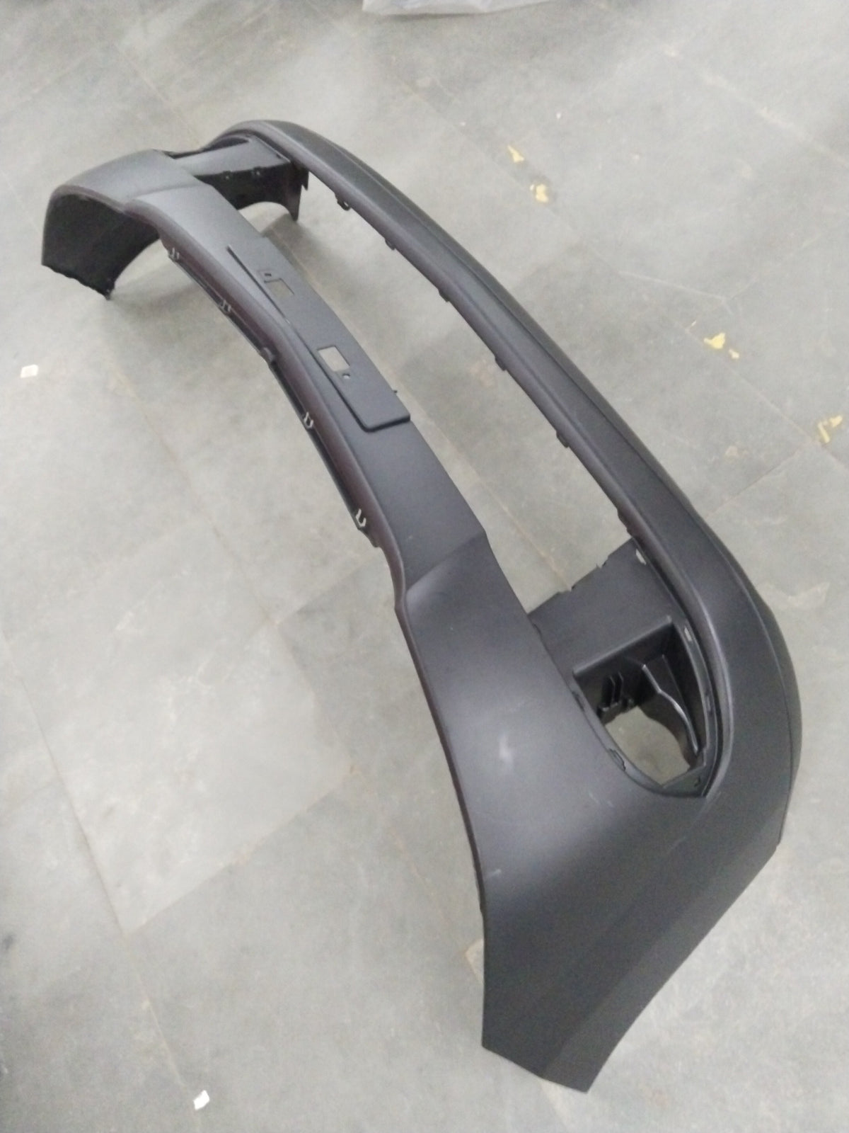 Maruti Suzuki front bumper for WagonR 2nd Gen, A-Star, Zen Estilo, petrol and CNG models, shown in a clear close-up image.