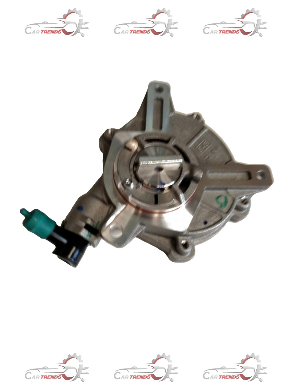 Mahindra Supro vacuum pump by CarTrends, showing a close-up of the black metal pump with attached hoses and fittings.
