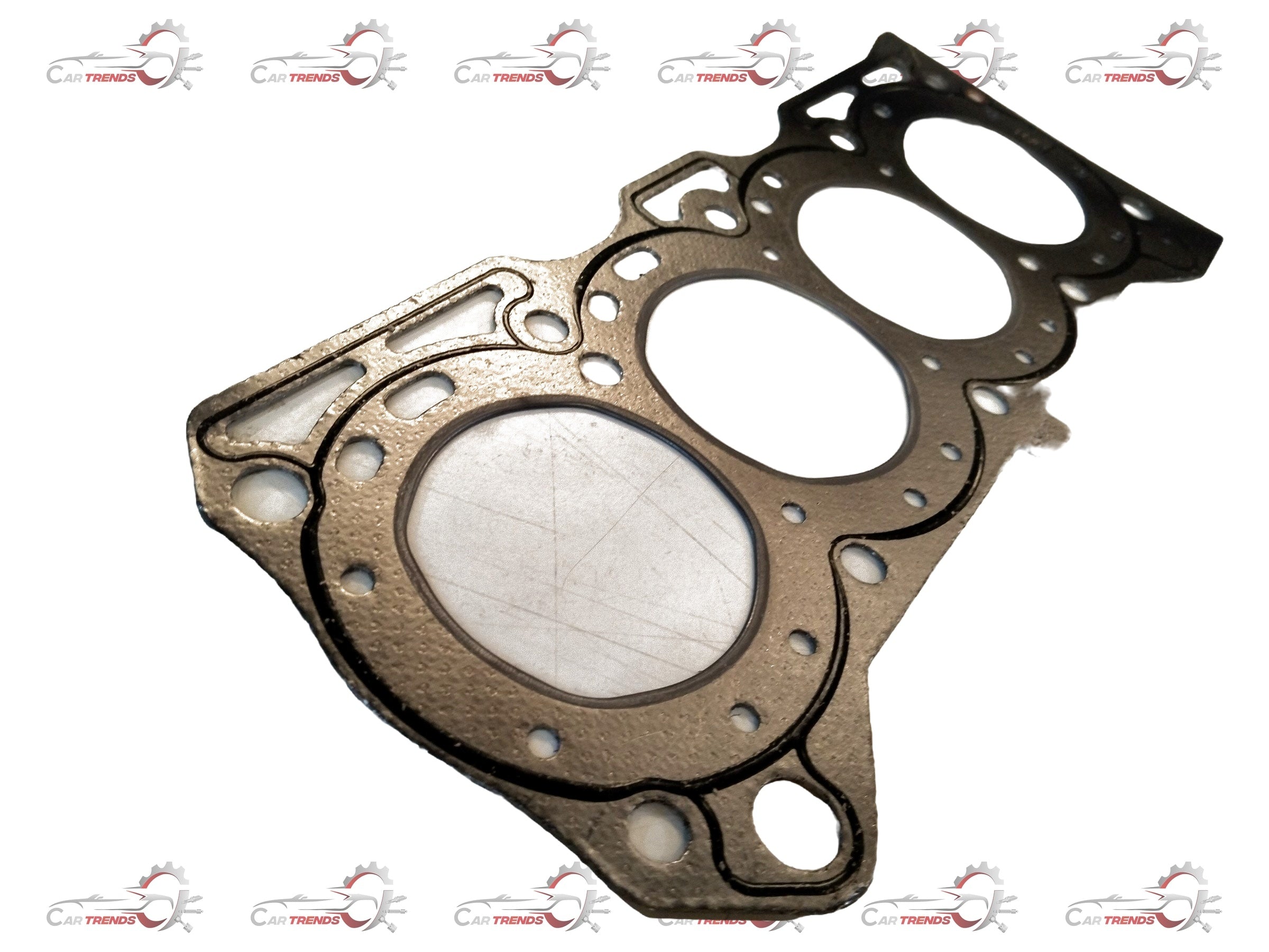 CarTrends Eeco head gasket spare part, showing the gasket's detailed rubber and metal construction for engine sealing.
