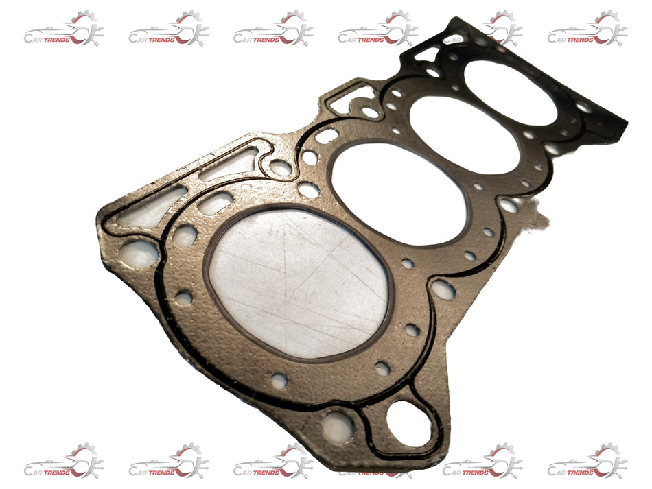 CarTrends Eeco head gasket spare part, showing the gasket's detailed rubber and metal construction for engine sealing.