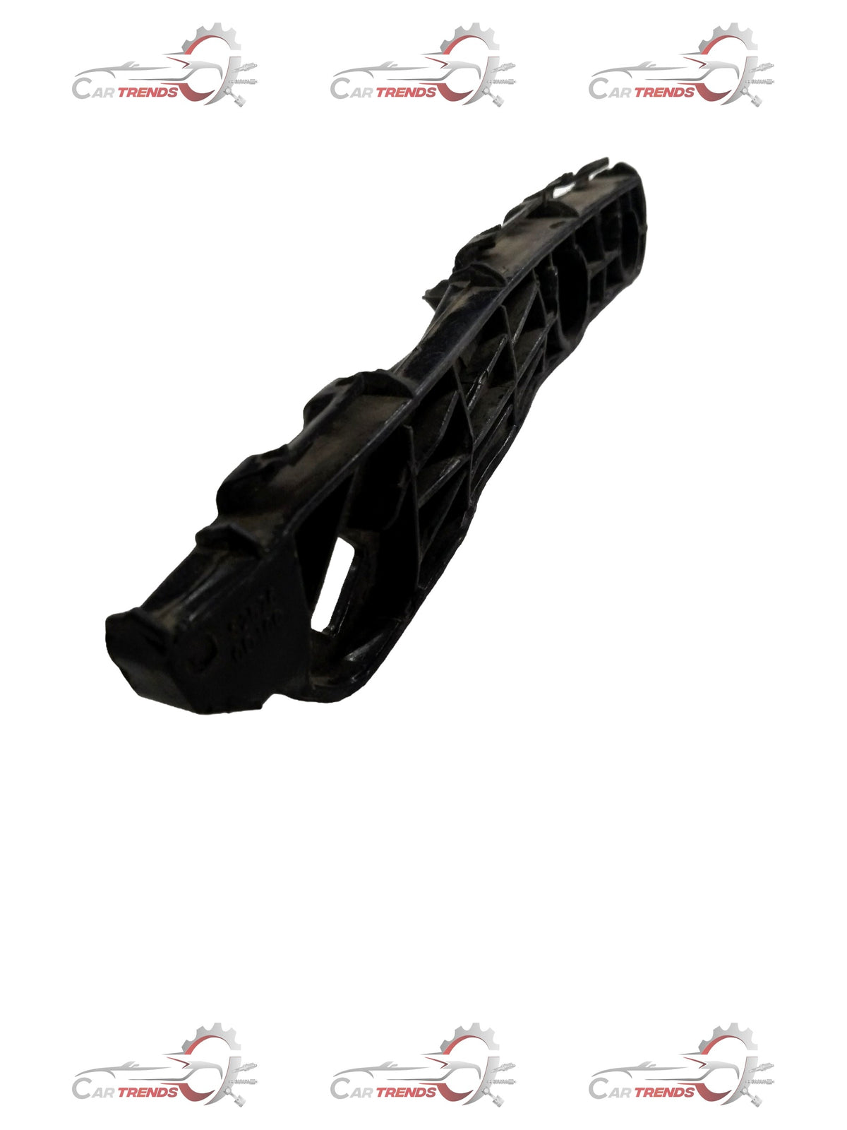 Toyota Yaris rear bumper retainer part #525760D100, LH side, visible in black plastic with clips for secure fitment.