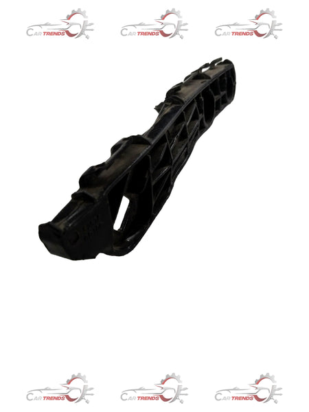 Toyota Yaris rear bumper retainer part #525760D100, LH side, visible in black plastic with clips for secure fitment.