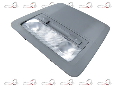 General Motors bezel dome lamp for Chevrolet Cruze, shown in close-up with detailed plastic and metal components.