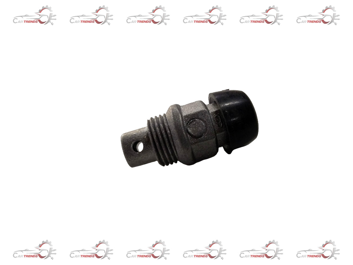 Chevrolet Optra engine spark plug from General Motors, showing the metal and ceramic components of the J94580520 plug.