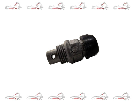 Chevrolet Optra engine spark plug from General Motors, showing the metal and ceramic components of the J94580520 plug.