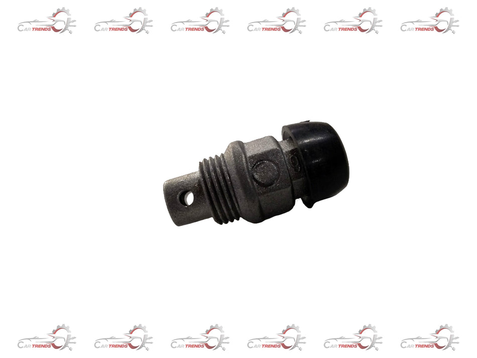 Chevrolet Optra engine spark plug from General Motors, showing the metal and ceramic components of the J94580520 plug.