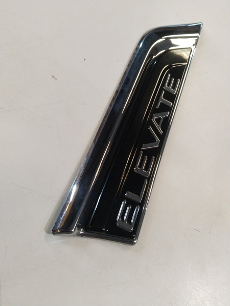 Honda Mobilio fender garnish kit in black, showing close-up of the sleek, molded plastic fender trim for vehicle enhancement.