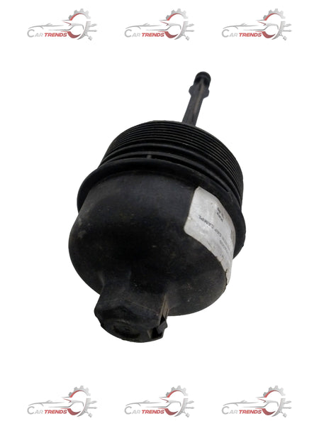 Hyundai oil filter cap for Creta engine, black plastic automotive part with threading for oil filter replacement.