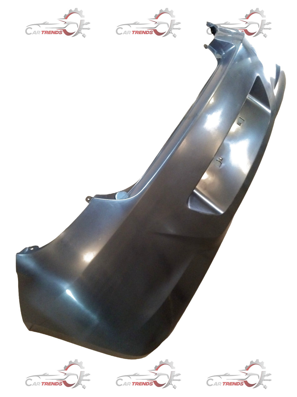 Hyundai I20 rear bumper in black, showing the exterior side with mounting points and smooth finish.