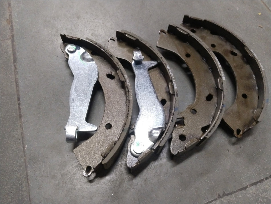 Rear brake shoe for Hyundai Santro Xing by CarTrends, showing the brake shoe component with detailed metal and friction surface.