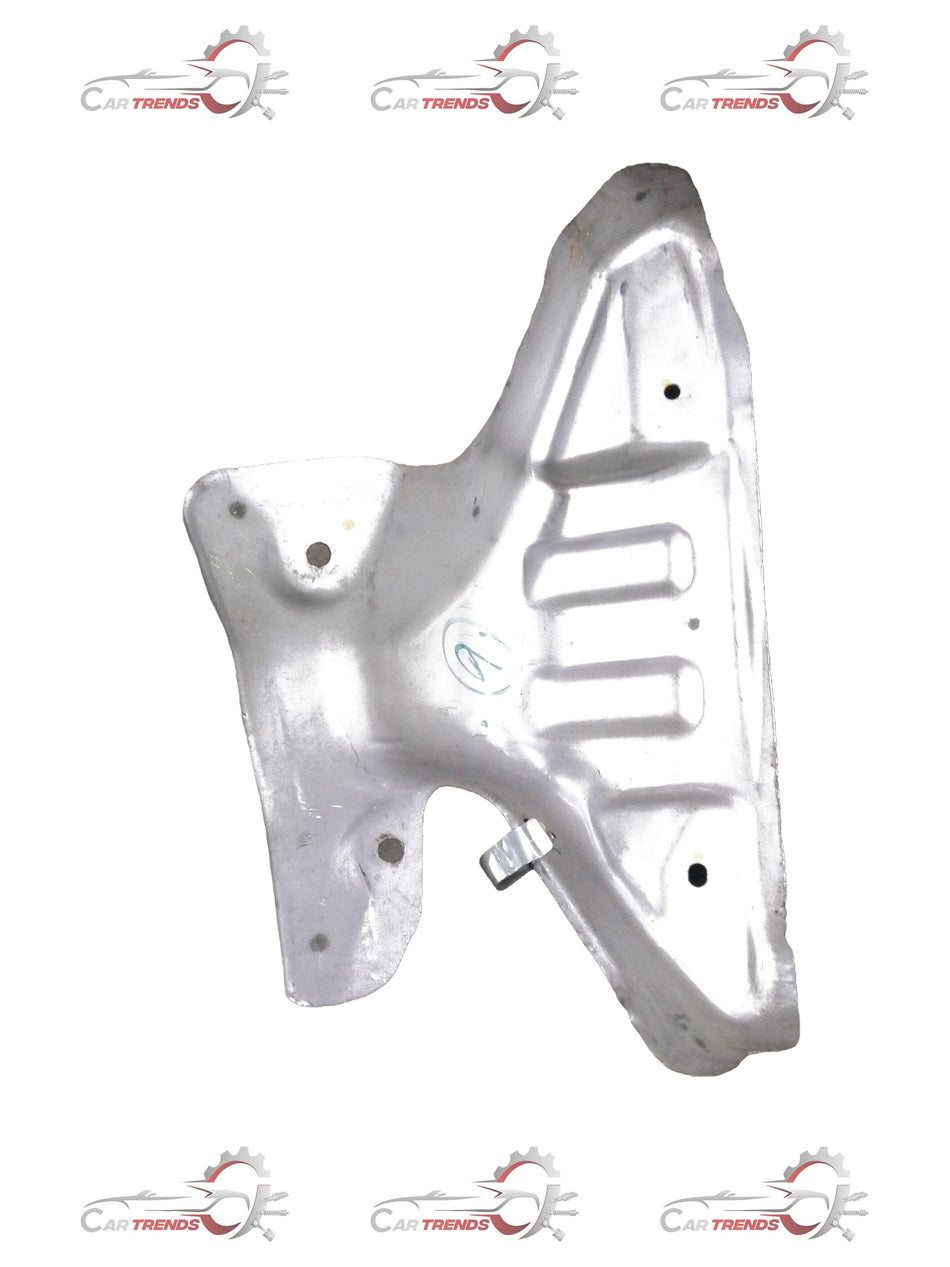 CarTrends Nissan Micra exhaust manifold cover showing a close-up of the metal part with mounting points and branding details.