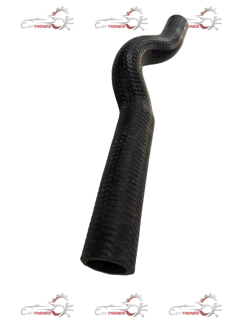 CarTrends heater hose outlet for Chevrolet Corsa engine, showing a close-up of the spare part with hoses and fittings.
