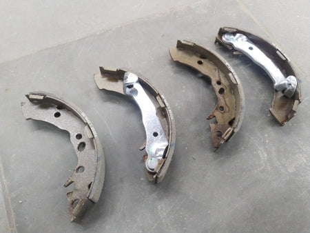 Rear brake shoe for Hyundai EON 0.8 by CarTrends, showing the metal brake shoe with friction material for vehicle braking system.