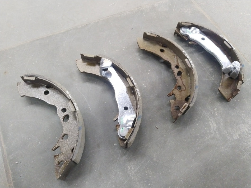 Rear brake shoe for Hyundai EON 0.8 by CarTrends, showing the metal brake shoe with friction material for vehicle braking system.