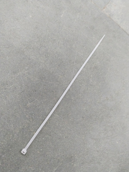 Aftermarket tie clip with 250*3 design, metal finish, and sleek style, suitable for formal or professional attire.