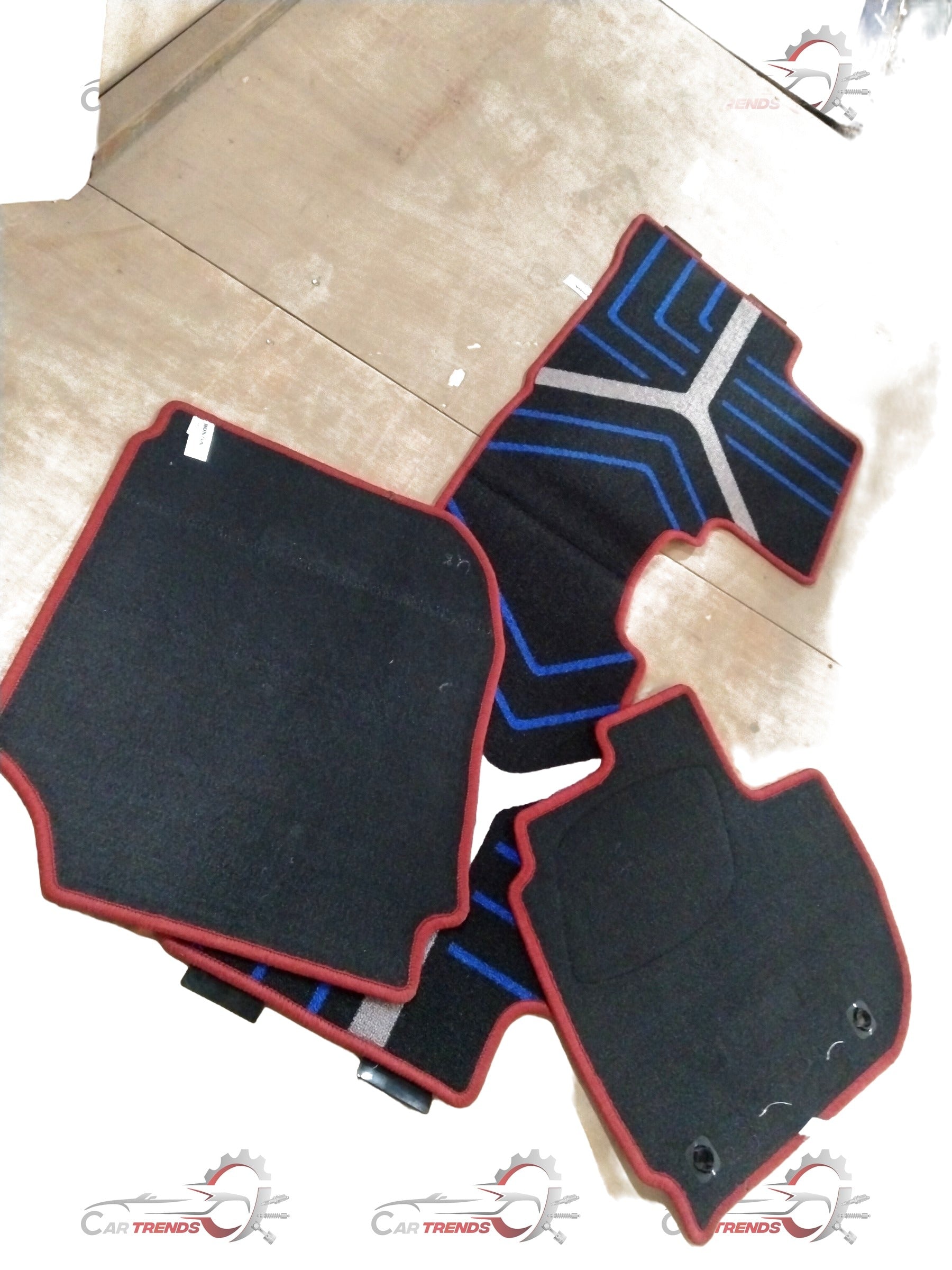 Red Honda floor mat for City, Amaze, Elevate, or WR-V models with textured surface and custom fit design.