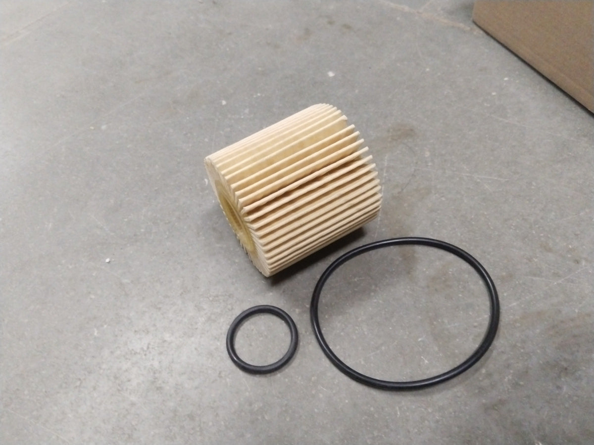 Toyota Camry oil filter spare part by CarTrends, showing the cylindrical oil filter used for engine maintenance.
