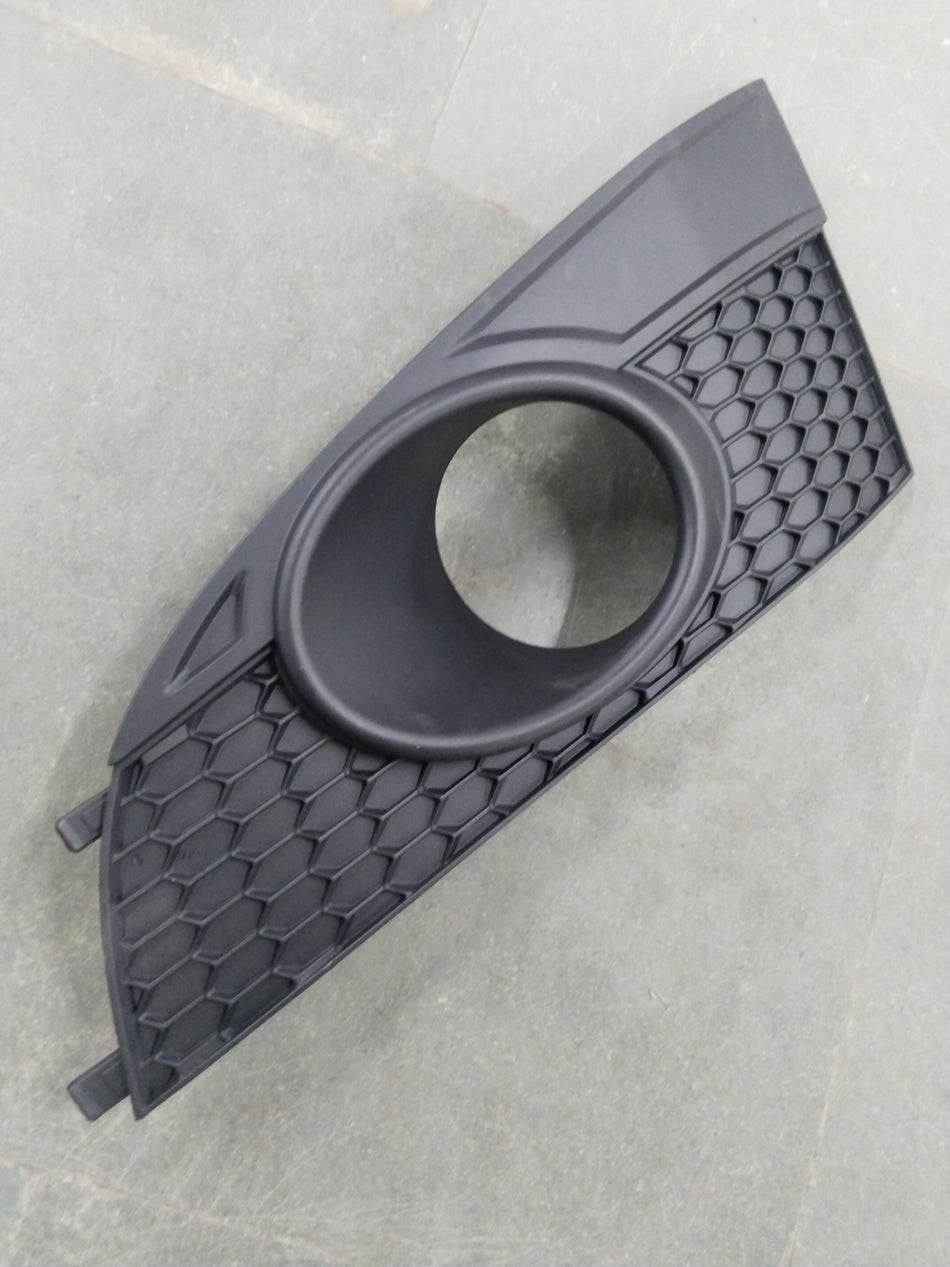 Front bumper lower fascia side for Chevrolet Captiva, LH side, made by General Motors, showing the black plastic grille with mounting points.