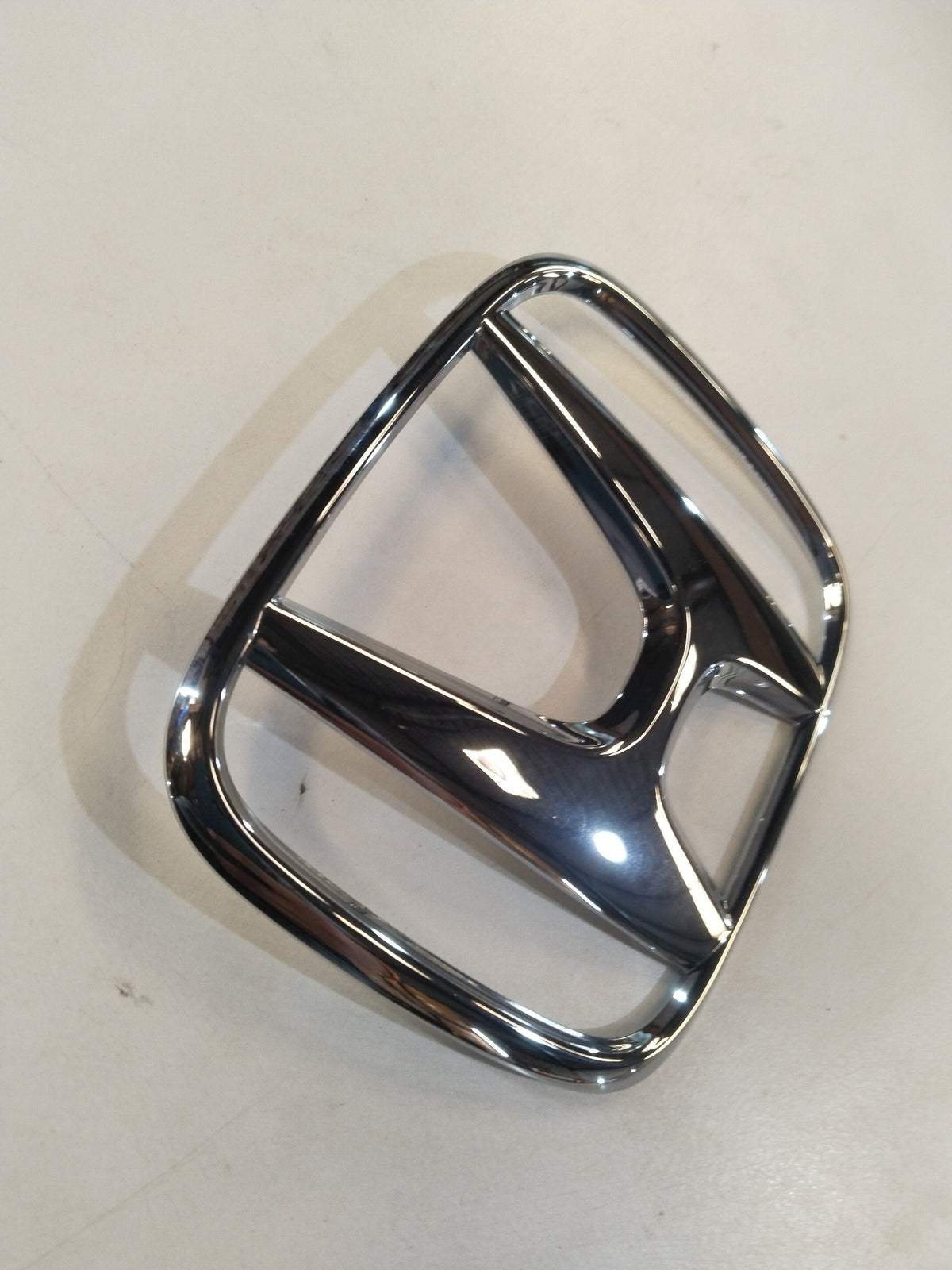 CarTrends EMBLEM H MARK | BRIO | FRONT | #75700TG2K00 75700TG2K00 - Back view