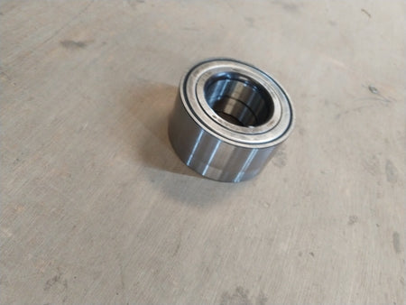 Front wheel bearing for Xcent by CarTrends, spare part with model #517200U000, showing the bearing component.