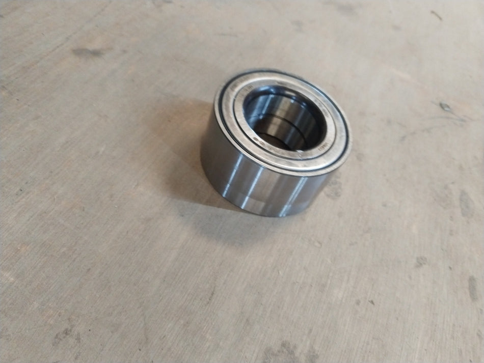 Front wheel bearing for Xcent by CarTrends, spare part with model #517200U000, showing the bearing component.