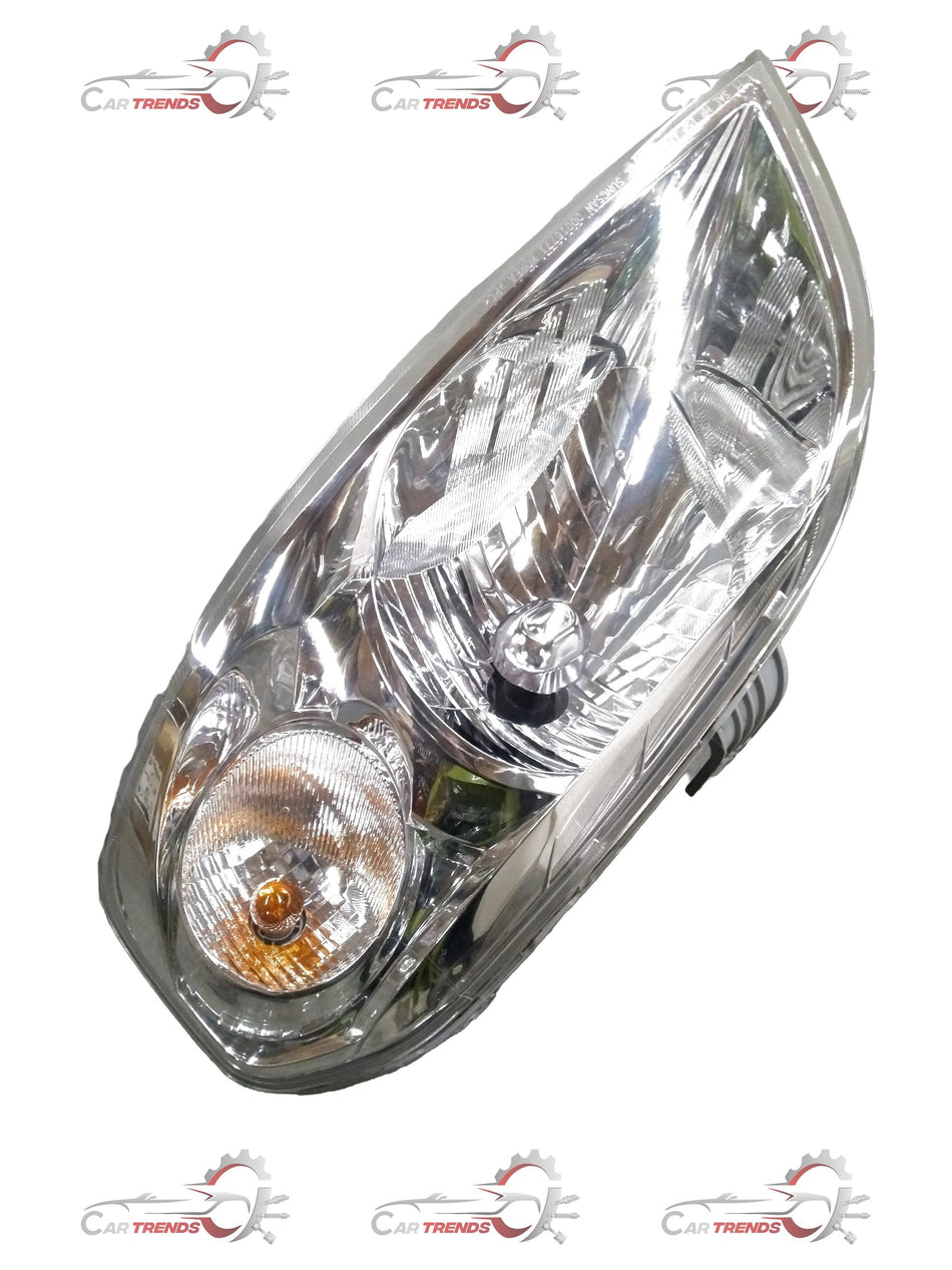 Chevrolet Aveo lamp head by General Motors, showing the vehicle's headlight assembly with clear lens and mounting details.