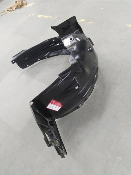 Honda Brio front inner left fender assembly in black with mounting points and surface details.