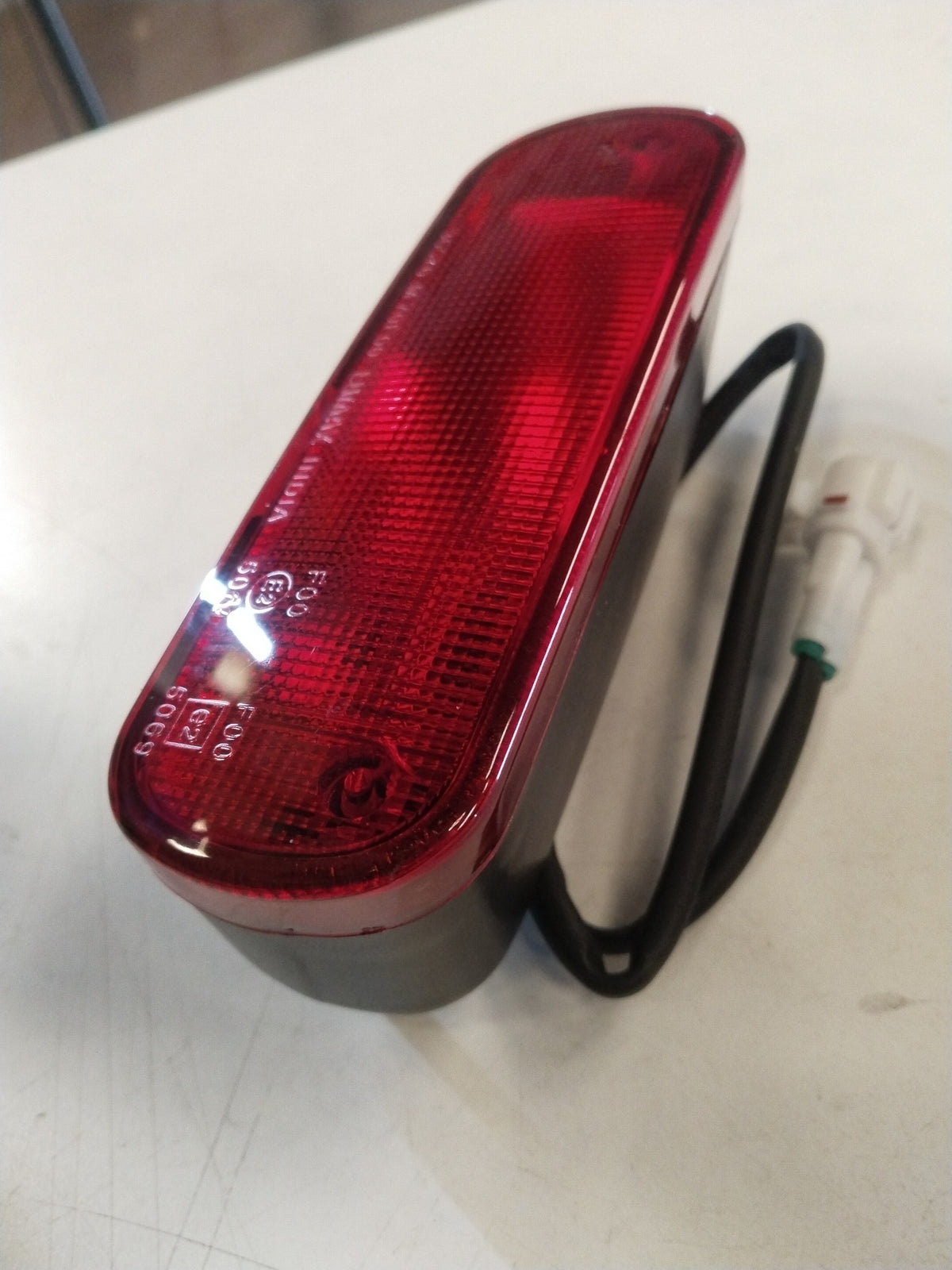 Maruti Suzuki Swift fog lamp assembly by CarTrends, showing the clear lens and mounting bracket for vehicle lighting upgrade.