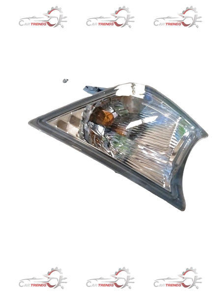 Toyota Hilux and Fortuner front turn lamp assembly, showing the clear plastic lens and mounting hardware.