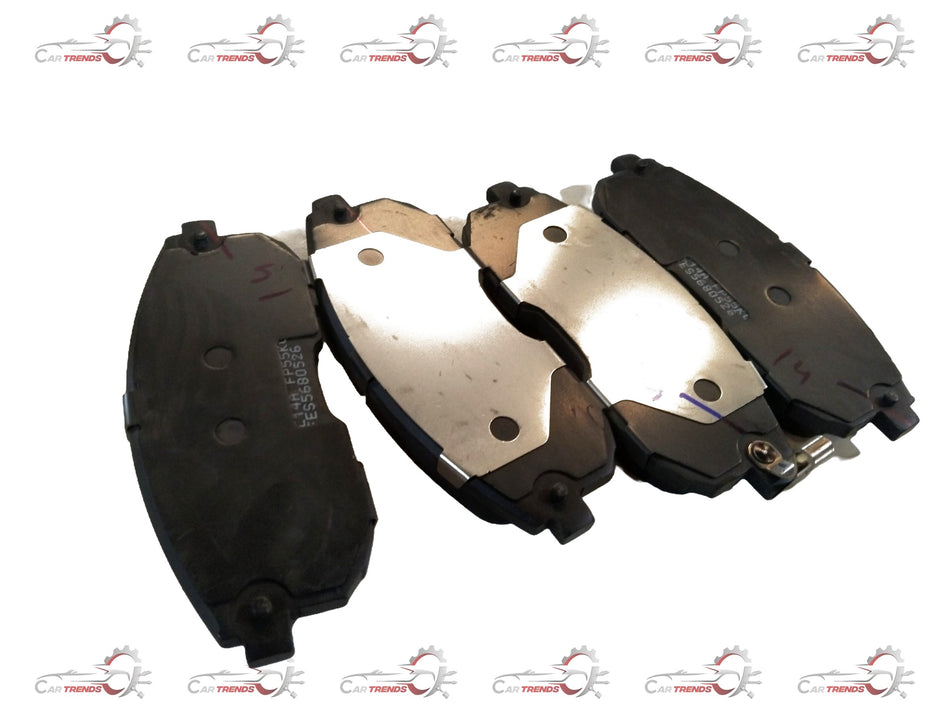 Front brake pad for Maruti Suzuki SX4, showing the new replacement part with metal backing and friction surface.