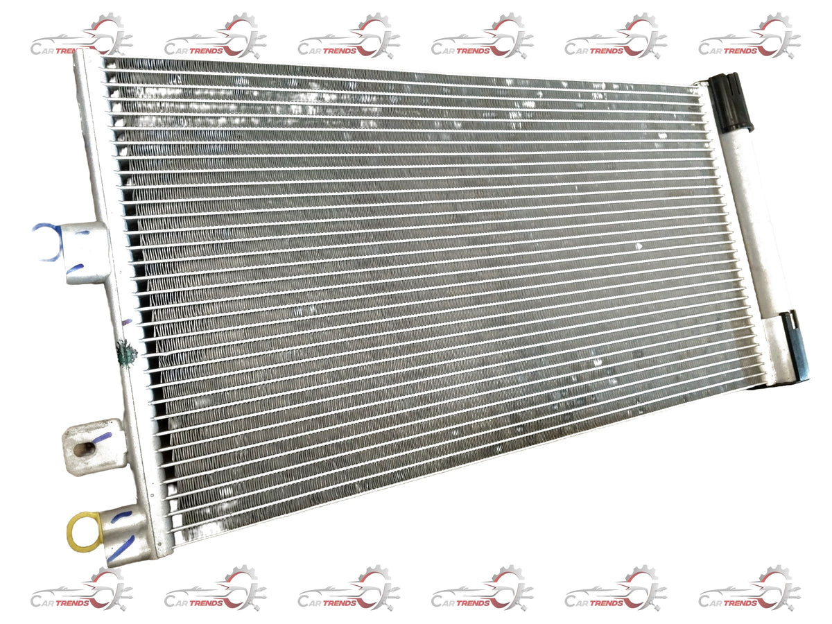 CarTrends Tata Nexon air conditioning condenser with metal fins and tubing, designed for efficient vehicle cooling.