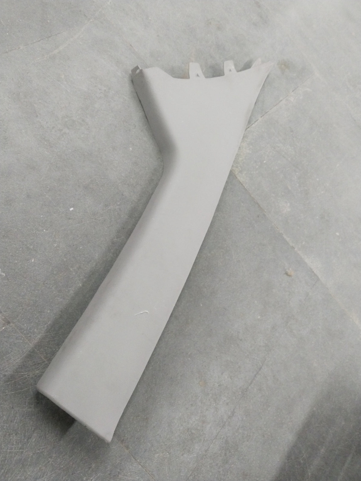 Chevrolet Beat molding assembly garnish on the right side, showing the exterior trim piece with textured surface and mounting details.