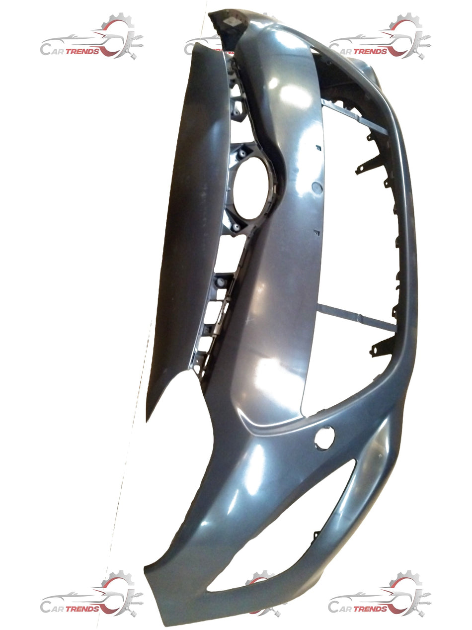 Front bumper for I20 car by CarTrends, spare parts image showing the black plastic bumper with mounting points