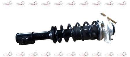 Maruti Suzuki Alto K10 front shock absorber left side, complete assembly with coil spring and mounting components.