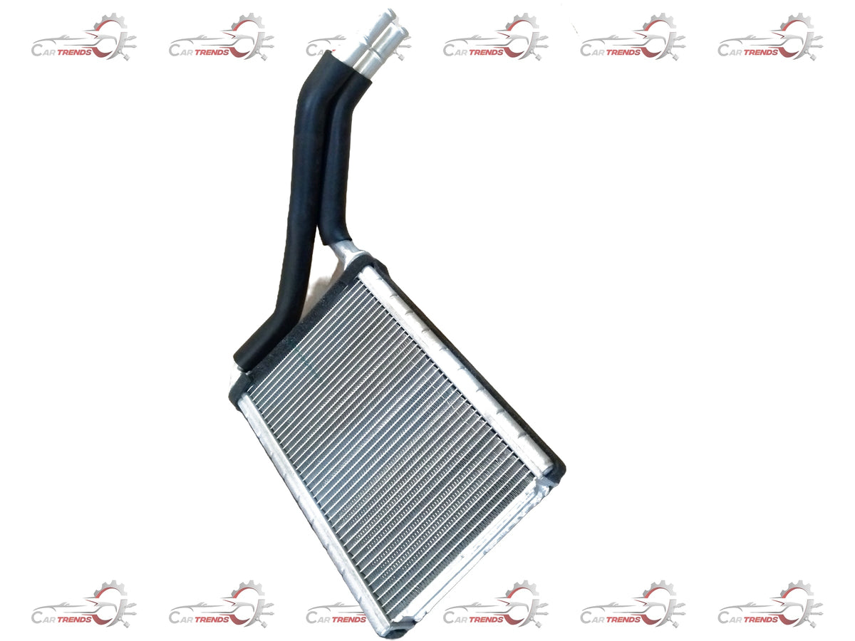 CarTrends heater core for Suzuki Swift Dezire, spare parts image showing the metal core with inlet and outlet fittings.